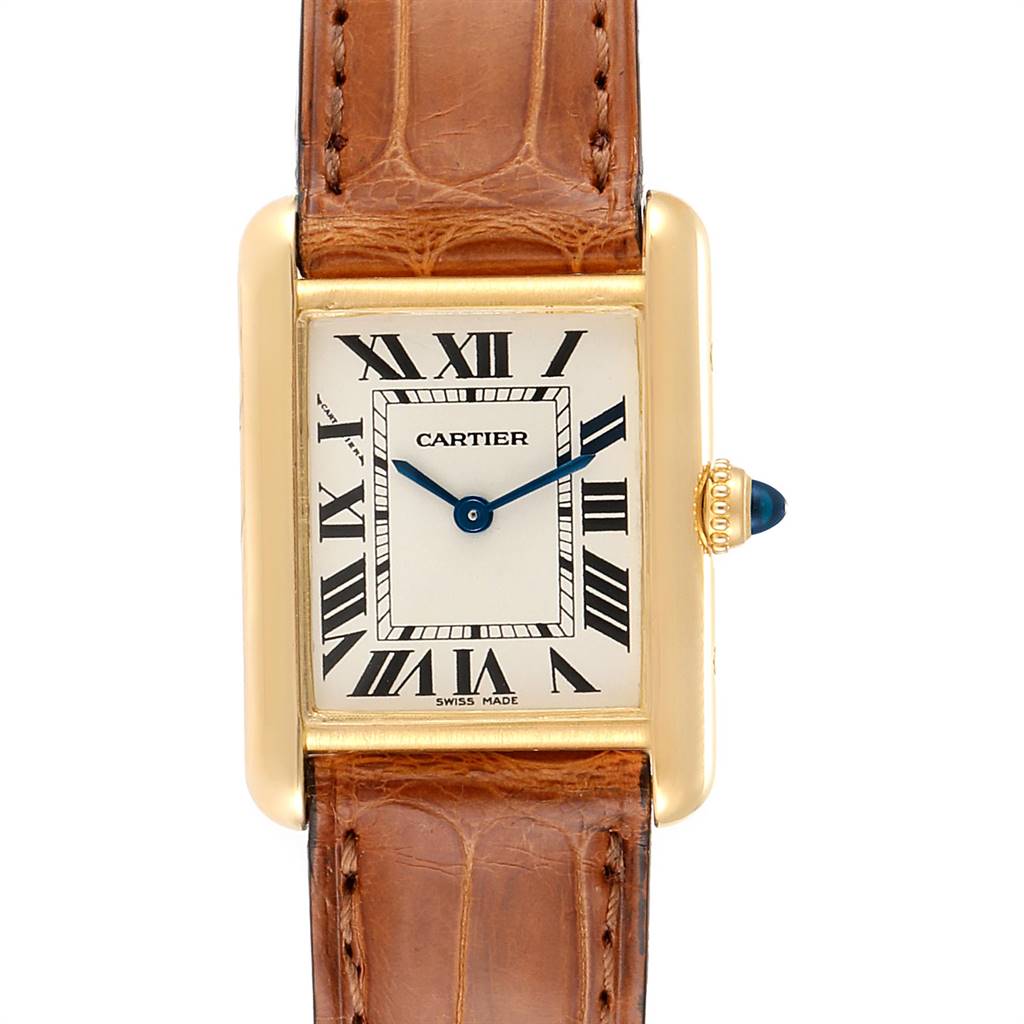 The image shows a Tank Louis model by Cartier viewed from the front, highlighting the face, bezel, crown, and leather strap.