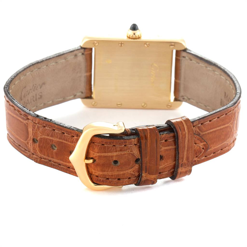 This is a rear view of the Cartier Tank Louis W1529856 Women
s Yellow Gold Silver Dial W1529856 Women
s Yellow Gold Silver Dial model watch, showing the strap, buckle, and case back.