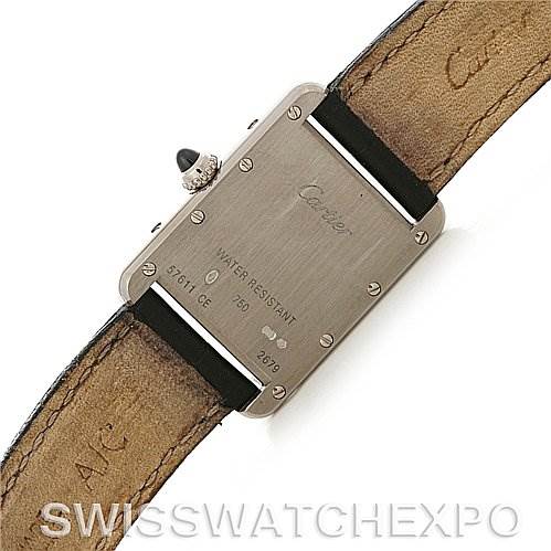 The image shows the back case and leather strap of a Cartier Tank Louis W1541056 Women's White Gold Silver Dial W1541056 Women's White Gold Silver Dial watch, displaying its water resistance and serial numbers.