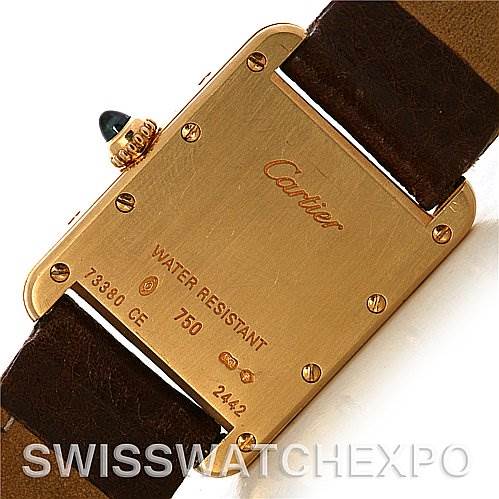 This image shows the back case and part of the strap of a Cartier Tank Louis W1529856 Women's Yellow Gold Silver Dial W1529856 Women's Yellow Gold Silver Dial watch.