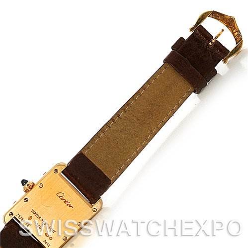This image shows the back of a Tank Louis Cartier watch with a close-up of the strap and buckle.