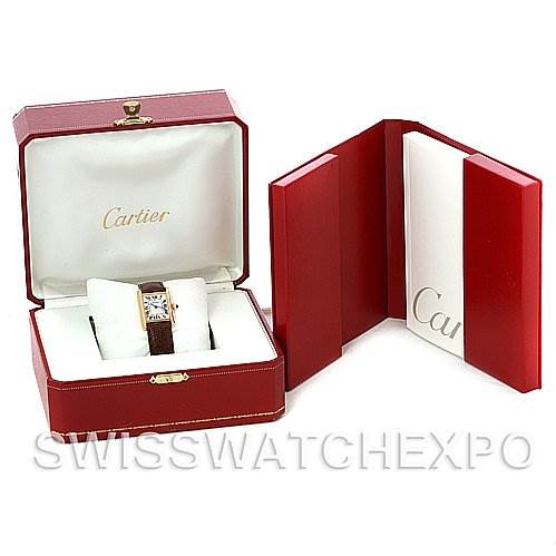 The image shows a Cartier Tank Louis W1529856 Women's Yellow Gold Silver Dial W1529856 Women's Yellow Gold Silver Dial watch in a red presentation box and an accompanying red booklet.