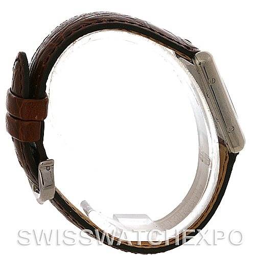 This side profile view of the Cartier Tank Louis W1541056 Women's White Gold Silver Dial W1541056 Women's White Gold Silver Dial watch shows the case, buckle, and brown leather strap.