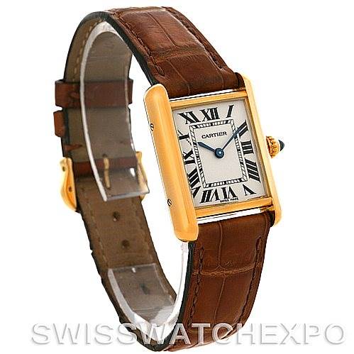 The image shows a side angle view of the Cartier Tank Louis W1529856 Women's Yellow Gold Silver Dial W1529856 Women's Yellow Gold Silver Dial watch, highlighting its face, leather strap, and crown.