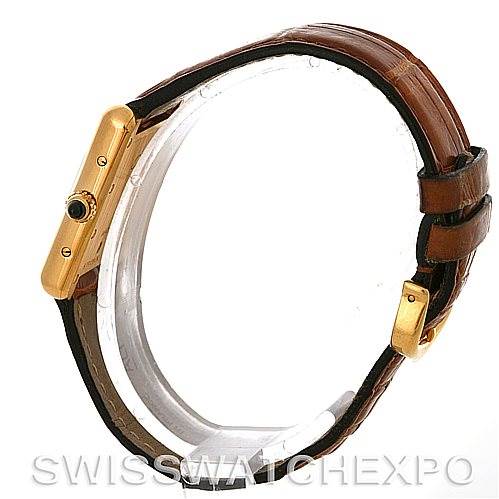 The image shows a side view of the Cartier Tank Louis W1529856 Women's Yellow Gold Silver Dial W1529856 Women's Yellow Gold Silver Dial watch, focusing on the case and brown leather strap.