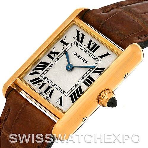 The image shows a Cartier Tank Louis W1529856 Women's Yellow Gold Silver Dial W1529856 Women's Yellow Gold Silver Dial watch at a slightly tilted angle, highlighting its rectangular face, Roman numerals, and brown leather strap.