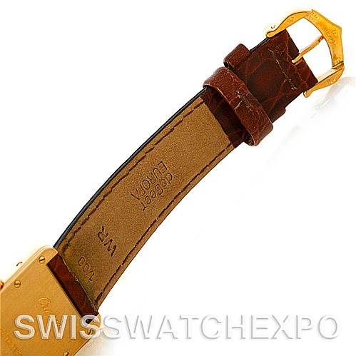 The image shows a side angle of the leather strap and gold buckle of the Cartier Tank Louis W1529856 Women's Yellow Gold Silver Dial W1529856 Women's Yellow Gold Silver Dial watch.