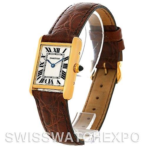 This image shows a side-angle view of the Tank Louis model by Cartier, highlighting its leather strap and rectangular face with Roman numerals.