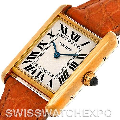 The image shows a Cartier Tank Louis W1529856 Women's Yellow Gold Silver Dial W1529856 Women's Yellow Gold Silver Dial watch angled to display its face, gold casing, and leather strap.
