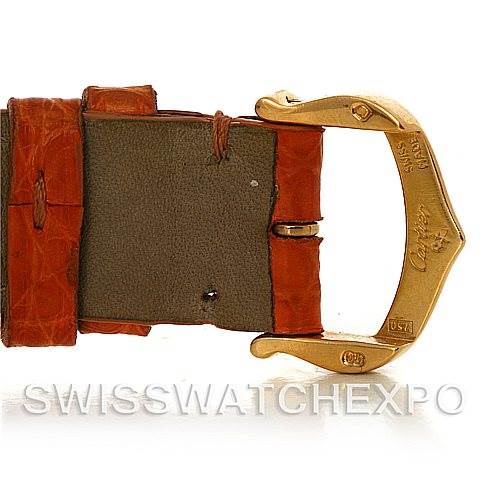 The image shows a close-up of the clasp and part of the strap of a Cartier Tank Louis W1529856 Women's Yellow Gold Silver Dial W1529856 Women's Yellow Gold Silver Dial watch.