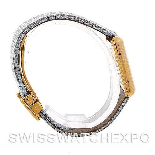 This side view of the Cartier Tank Louis 2415 Women's Yellow Gold Blue Dial 2415 Women's Yellow Gold Blue Dial watch shows the band, buckle, and the side of the rectangular case.