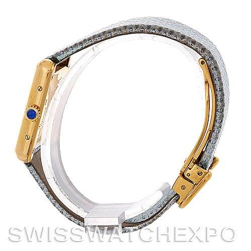 The Cartier Tank Louis 2415 Women's Yellow Gold Blue Dial 2415 Women's Yellow Gold Blue Dial watch is shown from a side angle, highlighting the case, crown, and strap.