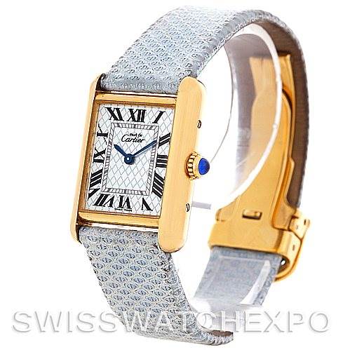 The image shows a front angled view of the Cartier Tank Louis 2415 Women's Yellow Gold Blue Dial 2415 Women's Yellow Gold Blue Dial watch, highlighting its face, strap, and clasp.