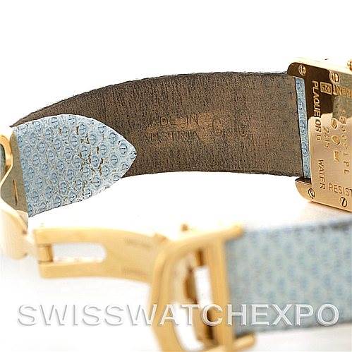 This image shows the back and buckle of a Tank Louis watch by Cartier, highlighting the strap and case back details.