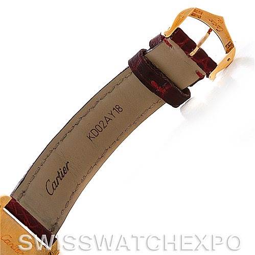 This image shows the leather strap and buckle of a Cartier Tank Louis W1529856 Women's Yellow Gold Silver Dial W1529856 Women's Yellow Gold Silver Dial watch from an angle that displays the inside of the strap.