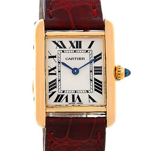 The Cartier Tank Louis W1529856 Women's Yellow Gold Silver Dial W1529856 Women's Yellow Gold Silver Dial watch is shown from the front, displaying its rectangular face, Roman numerals, gold case, and brown leather strap.