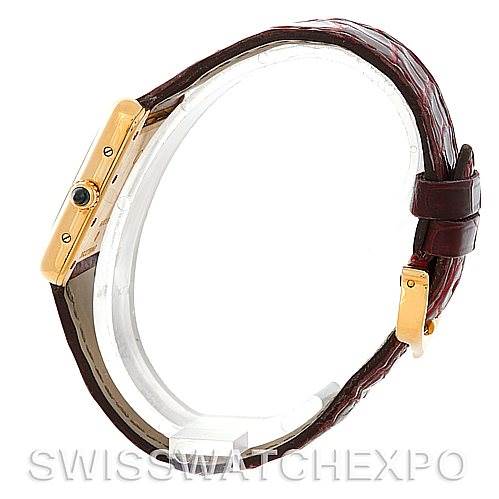 This side view of the Cartier Tank Louis W1529856 Women's Yellow Gold Silver Dial W1529856 Women's Yellow Gold Silver Dial watch showcases the watch case and brown leather strap.