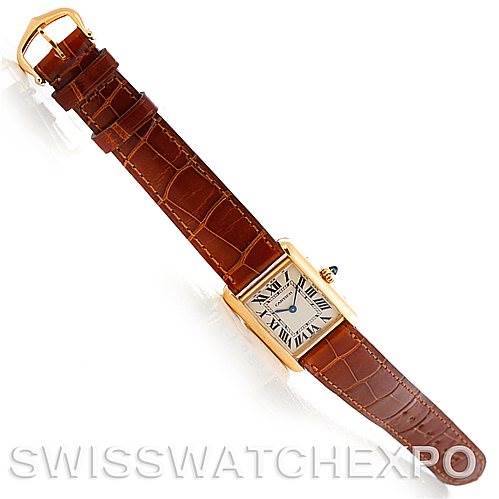 The image shows a top-down view of the Cartier Tank Louis W1529856 Women's Yellow Gold Silver Dial W1529856 Women's Yellow Gold Silver Dial watch, including the face, straps, buckle, and top crown.