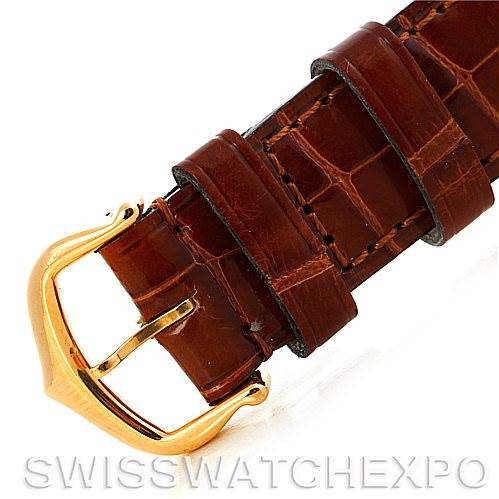 This image shows a close-up of the leather strap and gold buckle of the Cartier Tank Louis W1529856 Women's Yellow Gold Silver Dial W1529856 Women's Yellow Gold Silver Dial watch.