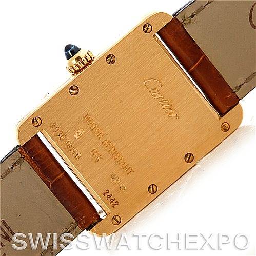 This image shows the back view of a Cartier Tank Louis W1529856 Women's Yellow Gold Silver Dial W1529856 Women's Yellow Gold Silver Dial watch, highlighting the case back, screws, and leather strap.
