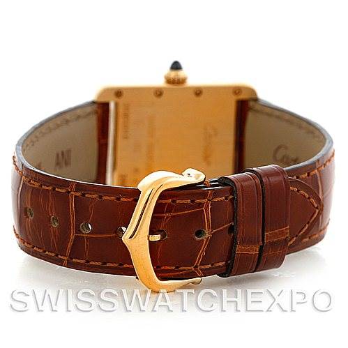 The image shows the rear view of the Cartier Tank Louis W1529856 Women's Yellow Gold Silver Dial W1529856 Women's Yellow Gold Silver Dial watch, highlighting its brown leather strap and gold buckle.