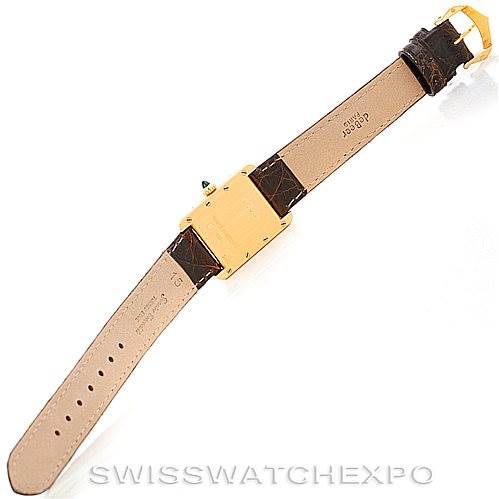 This image shows the back view of a Cartier Tank Louis W1529856 Women's Yellow Gold Silver Dial W1529856 Women's Yellow Gold Silver Dial watch, highlighting its leather strap and metal case.