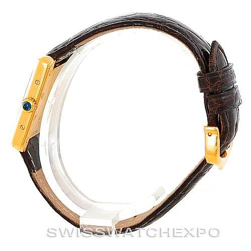 The image shows a side view of the Cartier Tank Louis W1529856 Women's Yellow Gold Silver Dial W1529856 Women's Yellow Gold Silver Dial watch, highlighting the crown and leather strap.