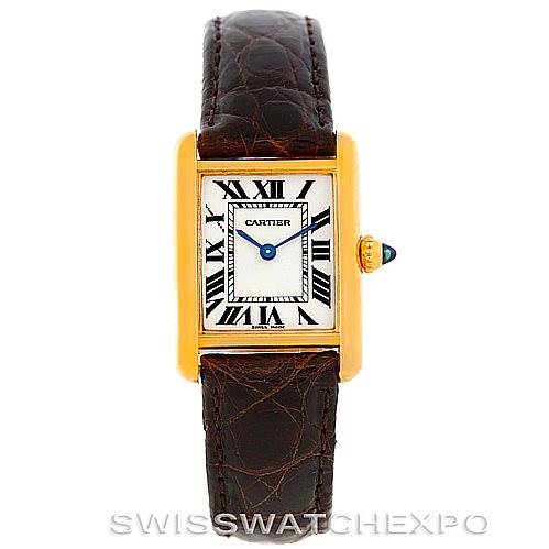 The image shows a front view of the Cartier Tank Louis W1529856 Women's Yellow Gold Silver Dial W1529856 Women's Yellow Gold Silver Dial watch with a gold rectangular case, white dial, Roman numerals, and brown leather strap.