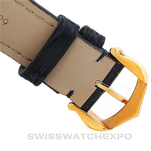 This image shows a close-up of the buckle and strap of the Cartier Tank Louis W1529856 Women's Yellow Gold Silver Dial W1529856 Women's Yellow Gold Silver Dial watch, highlighting the gold buckle and leather strap.