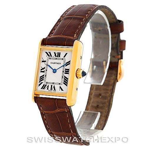 The Cartier Tank Louis W1529856 Women's Yellow Gold Silver Dial W1529856 Women's Yellow Gold Silver Dial watch is shown at a side angle, featuring the face, strap, and crown with the signature blue cabochon.