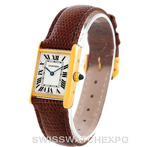 This image shows a Cartier Tank Louis W1529856 Women's Yellow Gold Silver Dial W1529856 Women's Yellow Gold Silver Dial watch at a slight angle, featuring the front face, gold case, and brown leather strap.