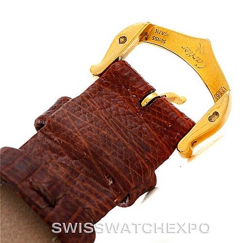 This image shows a close-up of the clasp and leather strap of a Cartier Tank Louis W1529856 Women's Yellow Gold Silver Dial W1529856 Women's Yellow Gold Silver Dial watch.