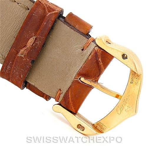 The image shows the buckle and strap ends of a Tank Louis model by Cartier from a close-up angle.
