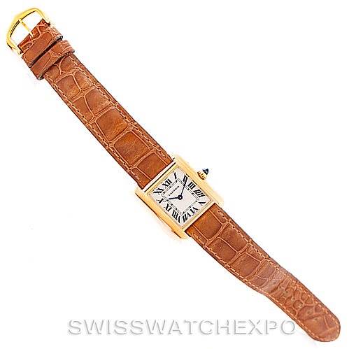 The image shows a Cartier Tank Louis W1529856 Women's Yellow Gold Silver Dial W1529856 Women's Yellow Gold Silver Dial watch, featuring its rectangular face and brown leather strap, viewed from a top-down angle.