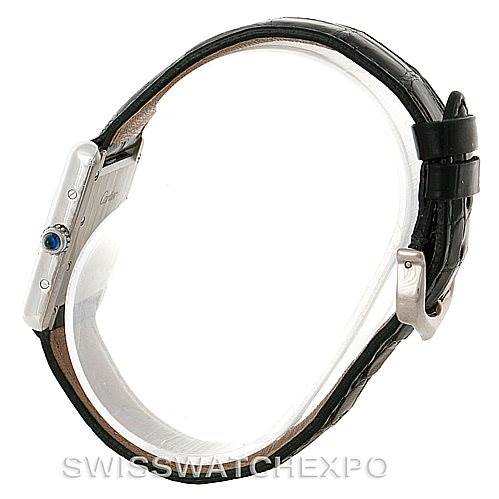 This side-angle view of the Cartier Tank Louis W1541056 Women's White Gold Silver Dial W1541056 Women's White Gold Silver Dial watch shows its profile, the crown with a blue cabochon, and the leather strap with a buckle.