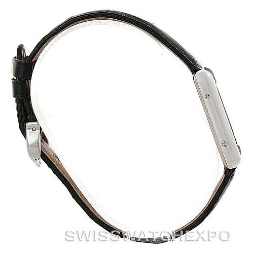 This image shows the Tank Louis Cartier watch from a side angle, highlighting its profile and leather strap.