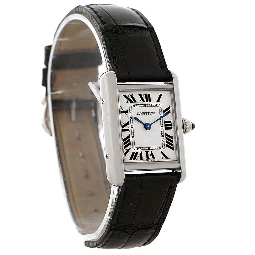 The image shows a Cartier Tank Louis W1541056 Women's White Gold Silver Dial W1541056 Women's White Gold Silver Dial model watch at an angle, highlighting its rectangular face, leather strap, and crown.