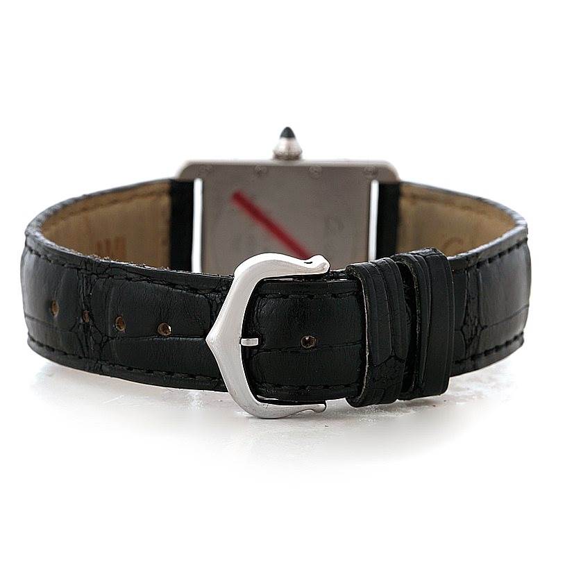 This image shows the back of a Cartier Tank Louis W1541056 Women's White Gold Silver Dial W1541056 Women's White Gold Silver Dial watch, focusing on the black leather strap and clasp.