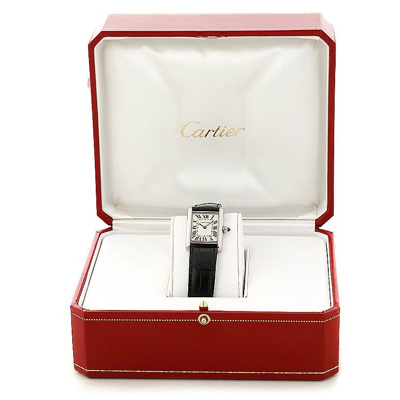 The Cartier Tank Louis W1541056 Women's White Gold Silver Dial W1541056 Women's White Gold Silver Dial watch is shown front-on, resting in its open red and white box.