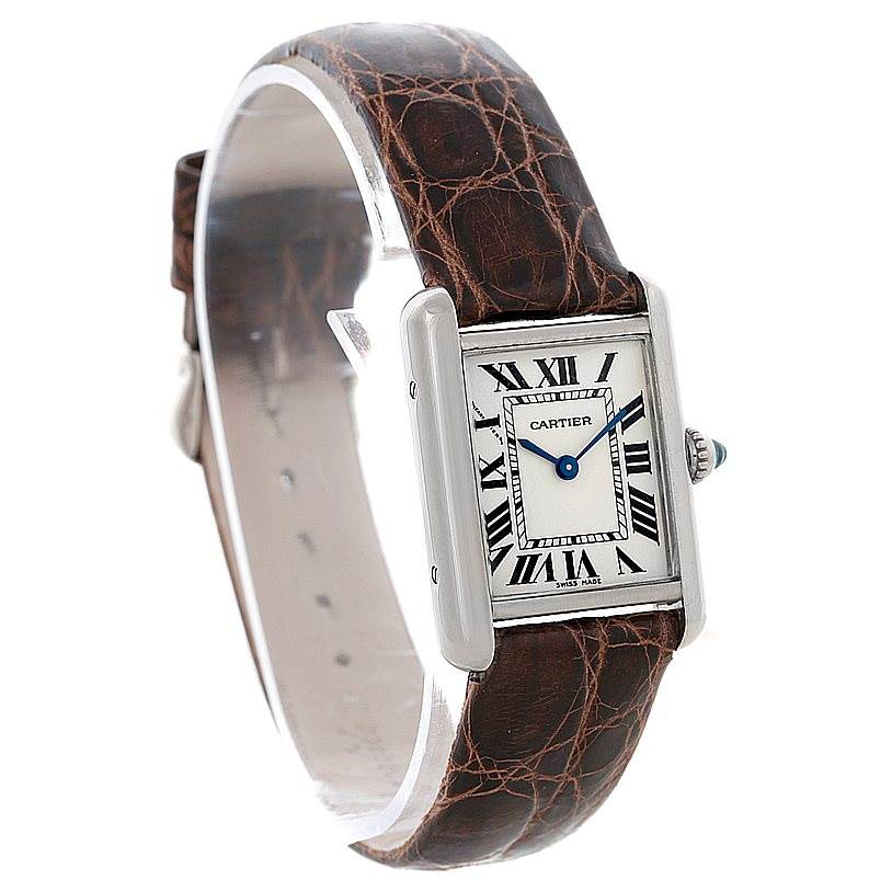 The image shows a Cartier Tank Louis W1541056 Women's White Gold Silver Dial W1541056 Women's White Gold Silver Dial watch from an angled side and top perspective, highlighting its face, bezel, and brown leather strap.
