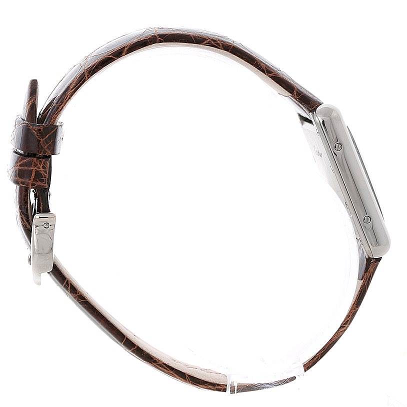 This is a side view of the Cartier Tank Louis W1541056 Women's White Gold Silver Dial W1541056 Women's White Gold Silver Dial watch showing its profile and leather strap.