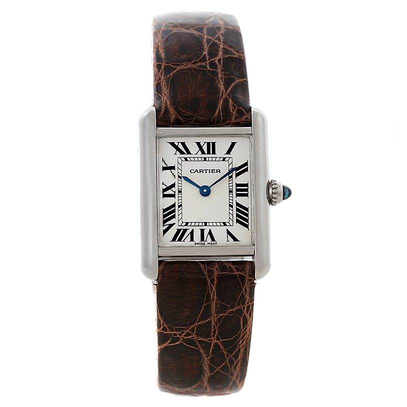 The image shows a front view of the Cartier Tank Louis W1541056 Women's White Gold Silver Dial W1541056 Women's White Gold Silver Dial watch, displaying its face, leather strap, and crown with a blue gem.
