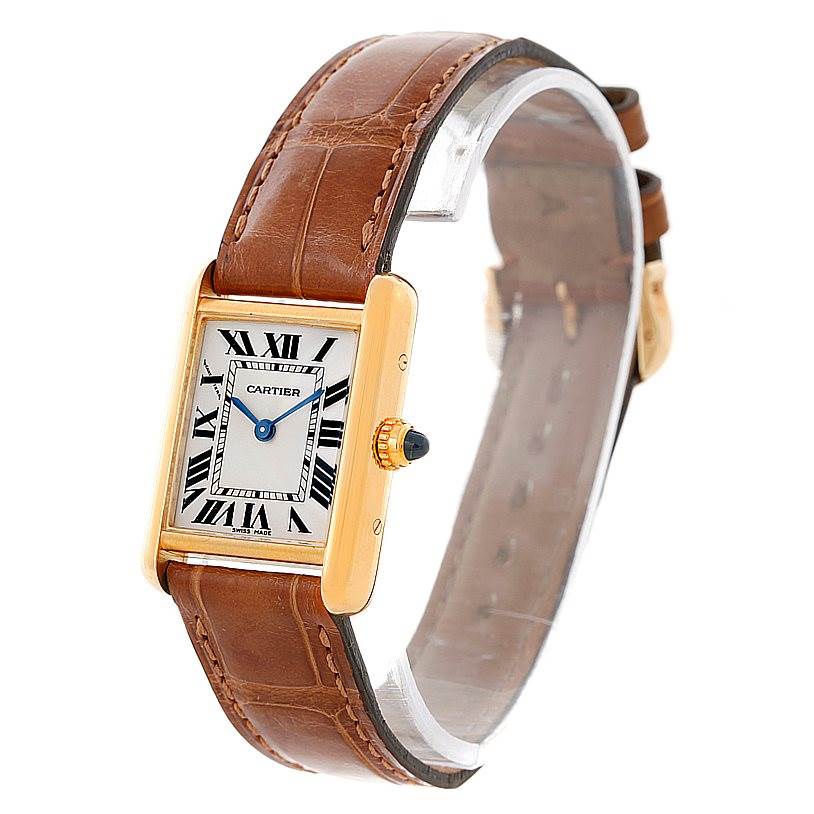 The image shows a Cartier Tank Louis W1529856 Women's Yellow Gold Silver Dial W1529856 Women's Yellow Gold Silver Dial watch at an angle displaying its face, leather strap, and side view.