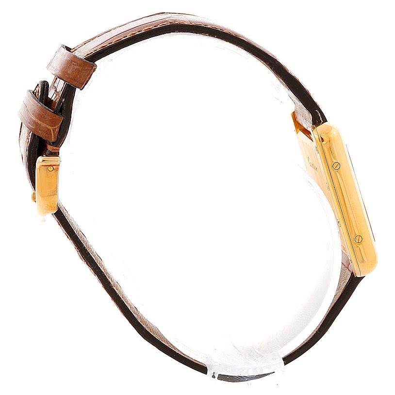 The image shows a side view of the Cartier Tank Louis W1529856 Women's Yellow Gold Silver Dial W1529856 Women's Yellow Gold Silver Dial watch, highlighting the gold case and brown leather strap.