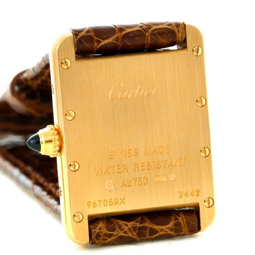 This image shows the back of a Cartier Tank Louis W1529856 Women's Yellow Gold Silver Dial W1529856 Women's Yellow Gold Silver Dial watch, including the crown and leather strap.