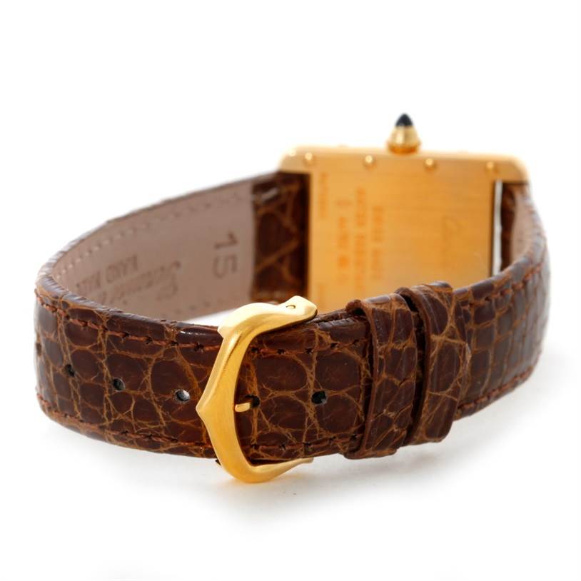 The image shows the back of the Cartier Tank Louis W1529856 Women's Yellow Gold Silver Dial W1529856 Women's Yellow Gold Silver Dial watch, focusing on the leather strap and clasp.