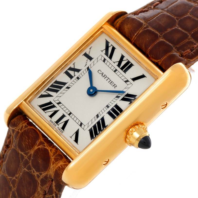 This image shows a Cartier Tank Louis W1529856 Women's Yellow Gold Silver Dial W1529856 Women's Yellow Gold Silver Dial watch angled to display the face, crown, and part of the leather strap.