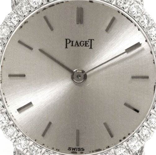 The image shows a close-up of the dial of a Vintage Ladies 18k White Gold Diamond Watch by Piaget 926/D/21 Women's White Gold Silver Dial 926/D/21 Women's White Gold Silver Dial.