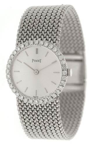 The image shows a front view of the Piaget 926/D/21 Women's White Gold Silver Dial 926/D/21 Women's White Gold Silver Dial Vintage Ladies 18k White Gold Diamond Watch, highlighting the dial, bezel, and bracelet.