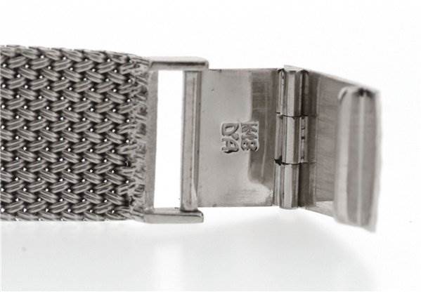 This image shows the clasp and part of the band of the Vintage Ladies 18k White Gold Diamond Watch by Piaget 926/D/21 Women's White Gold Silver Dial 926/D/21 Women's White Gold Silver Dial from a side angle.